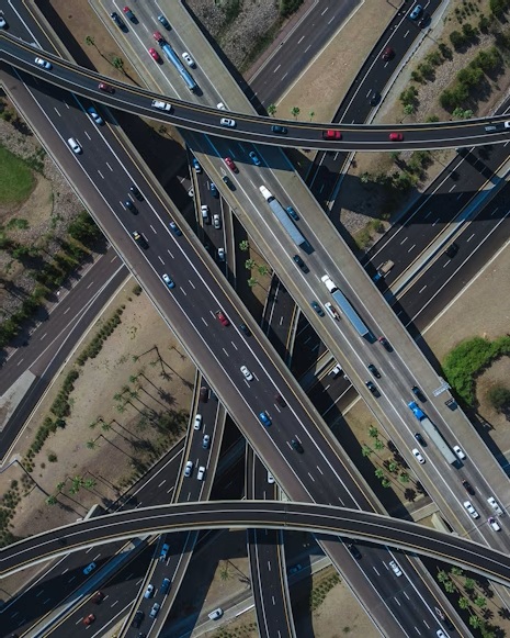 A web of road and bridges with cars moving